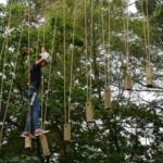 Klimbos tijdens bushcraft zomerkamp